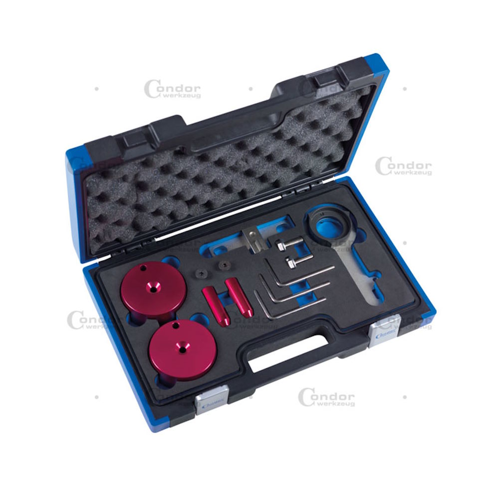 Werkzeuge – Qualität für Profis Beim Öffnen eines blau-schwarzen Werkzeugkoffers kommt der Condor Motoreinstell-Werkzeug-Satz Ford zum Vorschein, der eine Reihe von Präzisionswerkzeugen enthält, darunter rote runde Komponenten und Metallschlüssel, die alle ordentlich in einem speziellen Schaumstoffeinsatz angeordnet sind – perfekt für alle, die problemlos einen Schraubenschlüsselsatz kaufen möchten. Jetzt kaufen