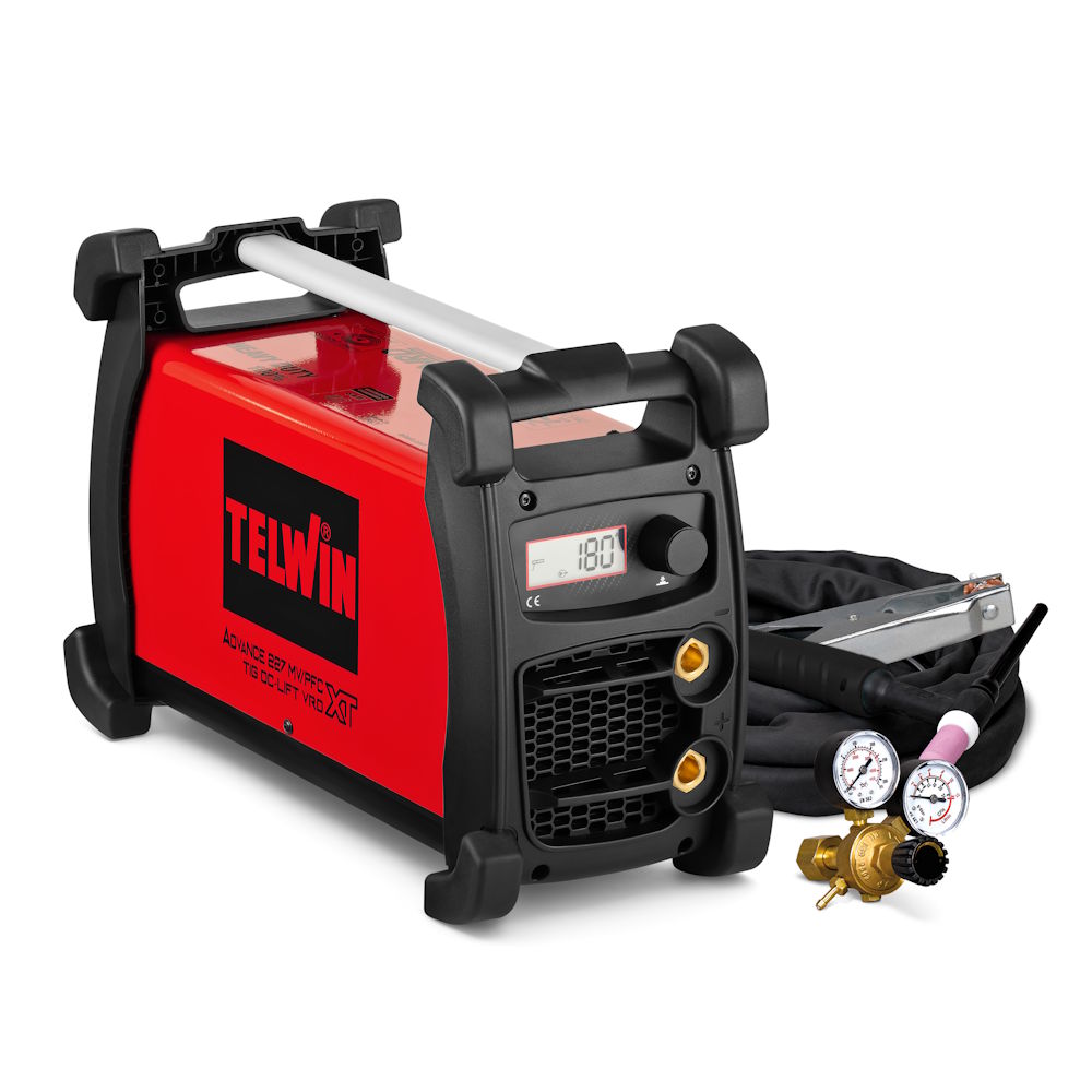 Werkzeuge – Qualität für Profis Ein TELWIN ADVANCE 227 XT MV/PFC VRD-Schweißgerät mit Digitalanzeige, angeschlossenen Stromkabeln und Gasreglern neben dem Gerät. Jetzt kaufen